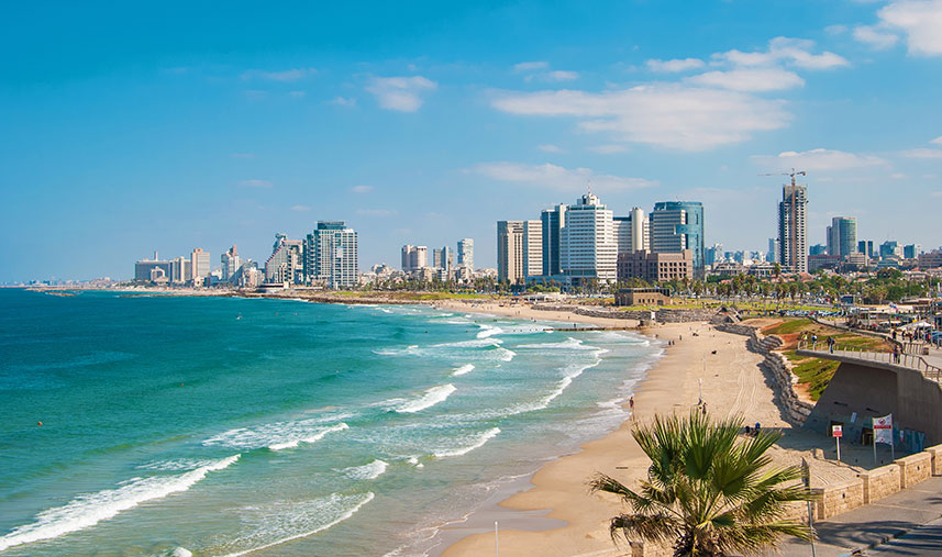 Water meets the sandy beach in Tel Aviv
