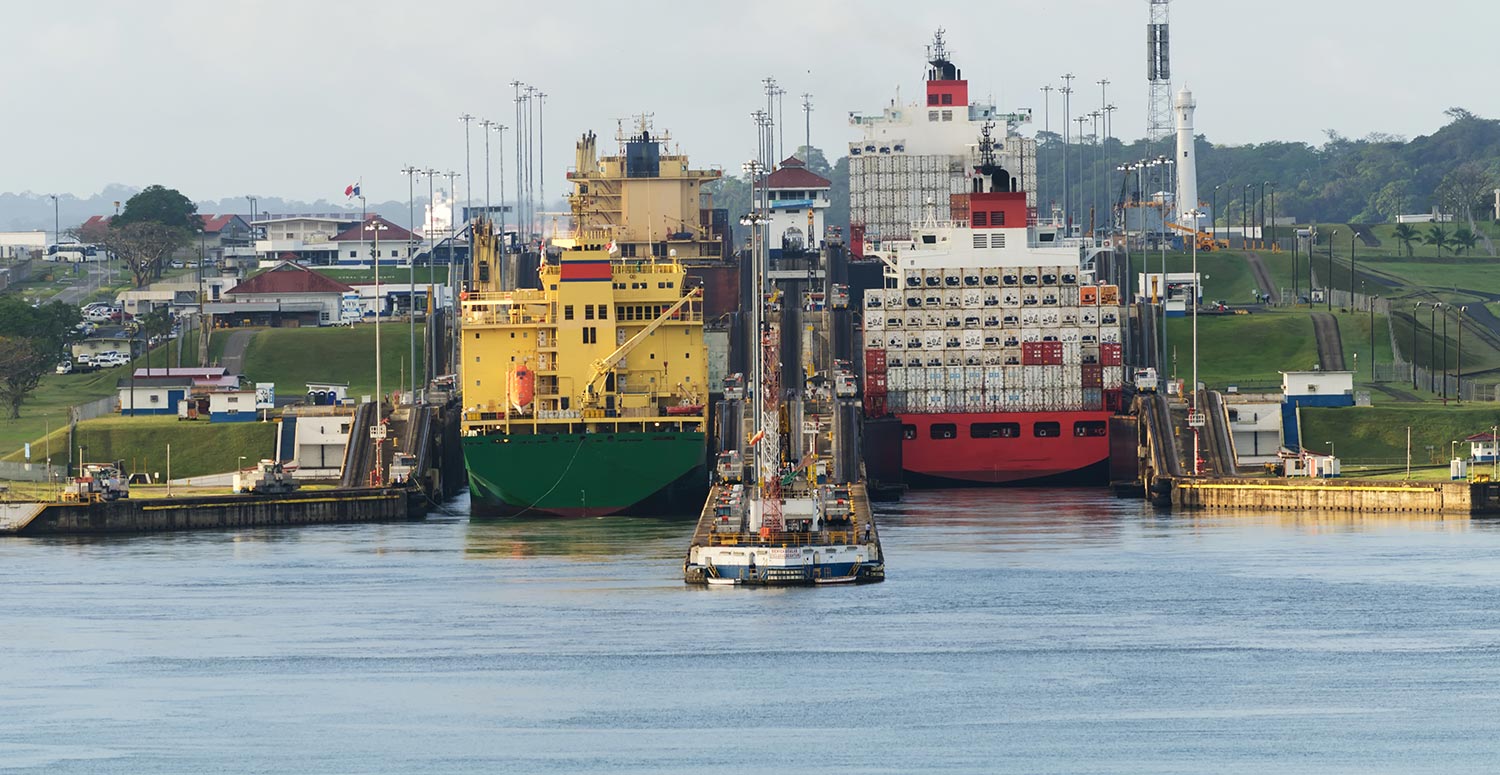 Barges with shipping containers docked in Brownsville