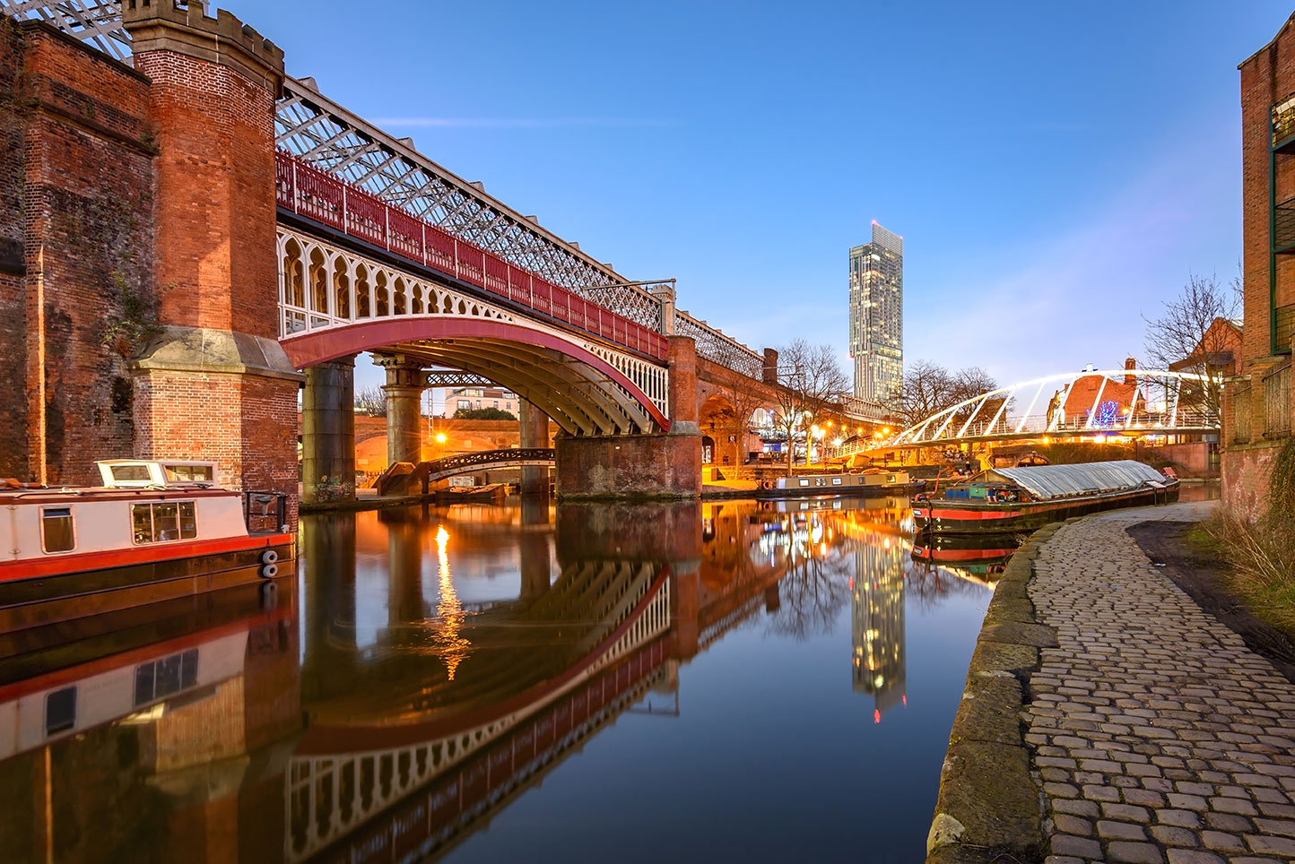 Red bridges over water canals in Manchester
